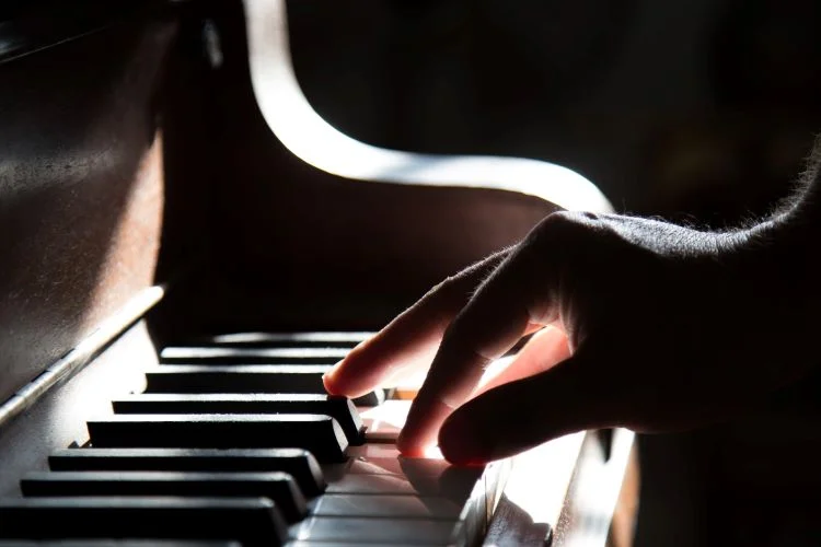 A hand playing piano in Sunderland