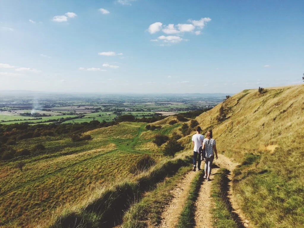 Couple walking along hillside in Sunderland