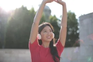 Woman stretching and smiling