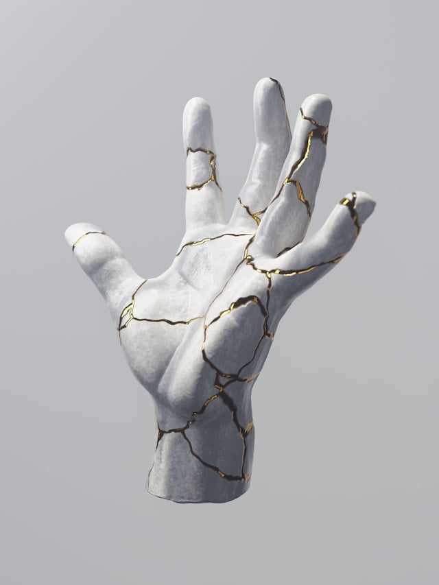 Marble hand repaired through Kintsugi